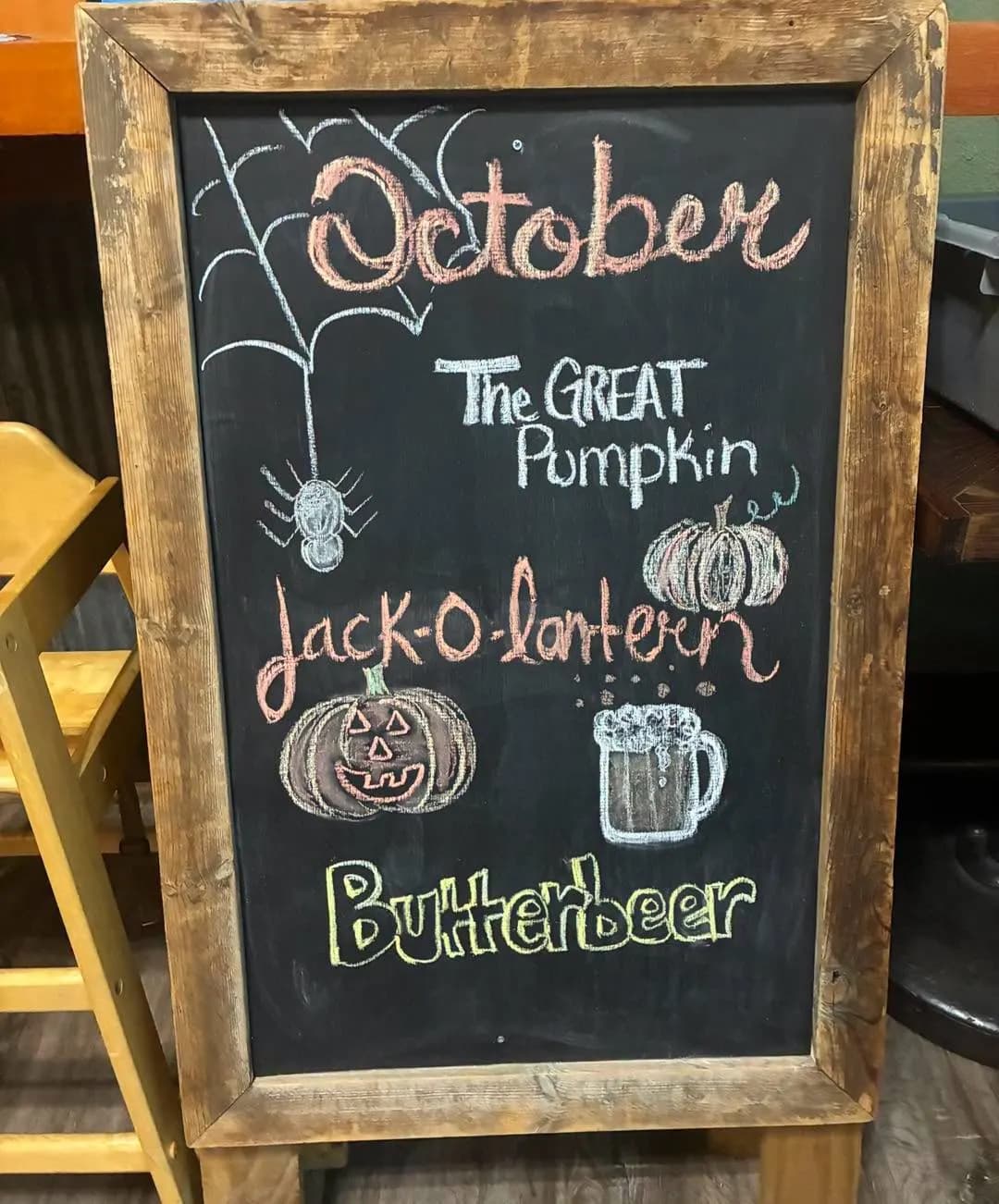 A chalkboard sign for October specials